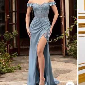 BRAND NEW 
Beautiful (off the shoulder) blue prom dress from The Gown Galleria
